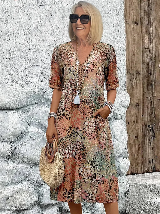 Isla – Midi-jurk met bloemenprint en V-hals