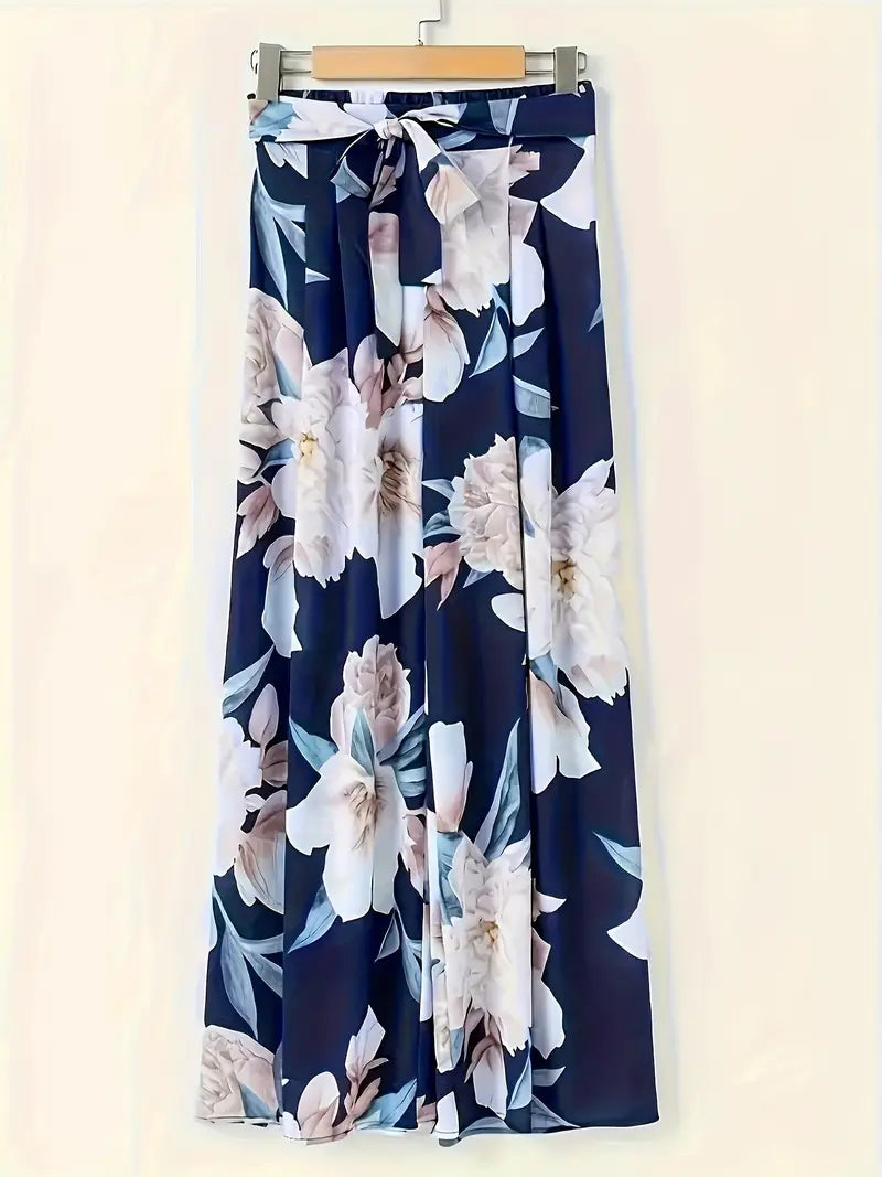 Aisling – Bloemenprint, hoge taille, wijde palazzo-broek met strikceintuur