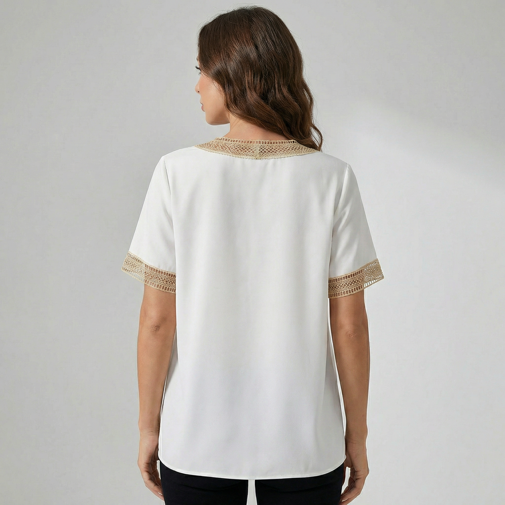 Dames top met V-hals en gouden randdetail