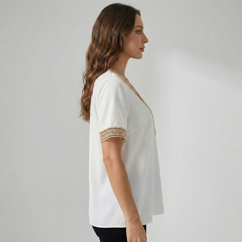Dames top met V-hals en gouden randdetail