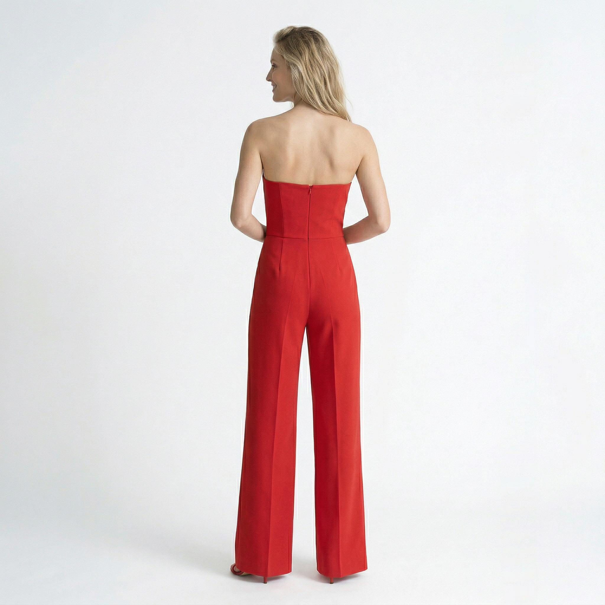 Strapless jumpsuit met hartvormige hals en wijde pijpen