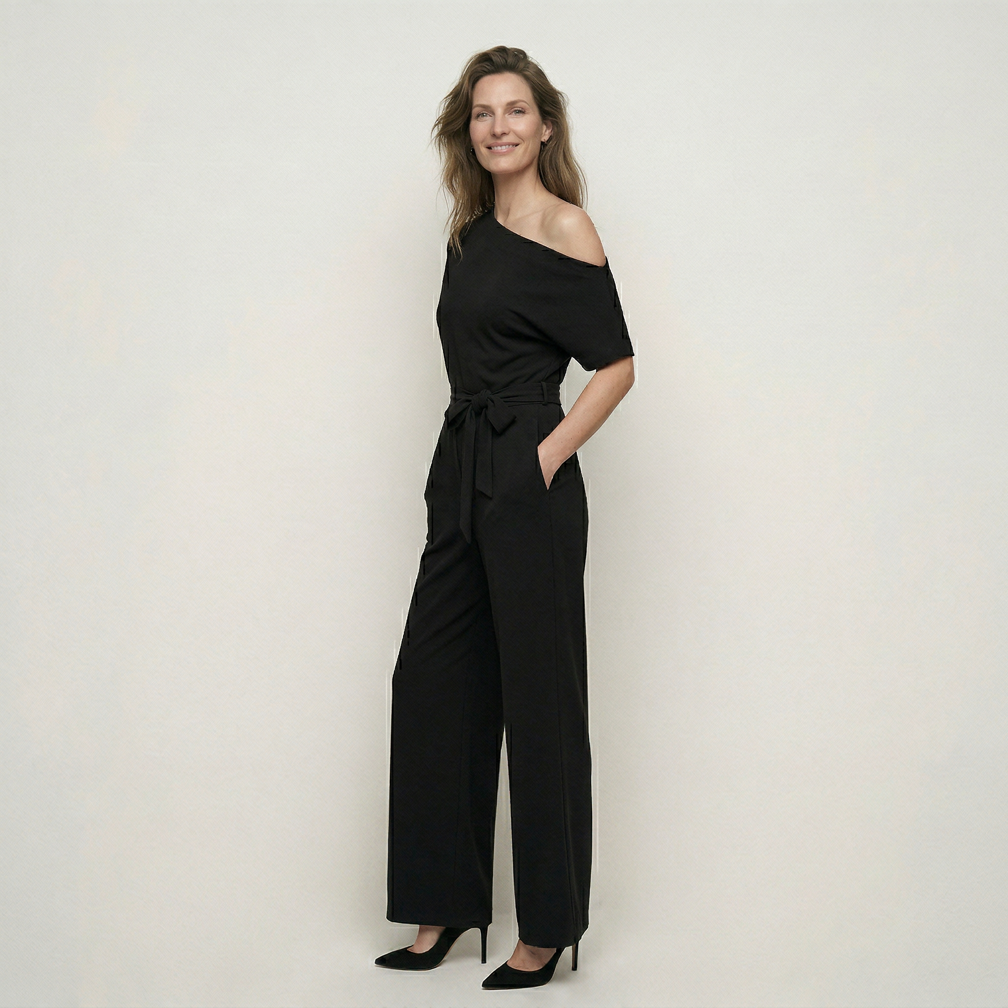 One shoulder jumpsuit met strikceintuur en wijde pijpen