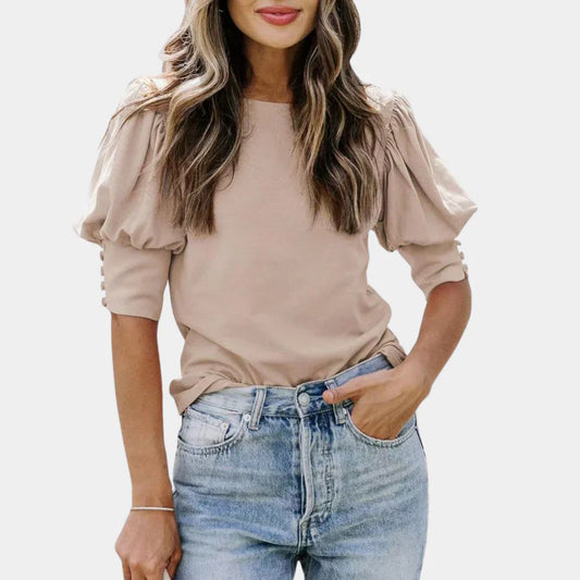 Tess – Oversized viscose blouse met en V-hals en plofmouwen