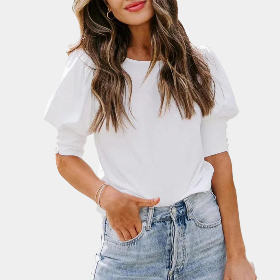 Tess – Oversized viscose blouse met en V-hals en plofmouwen
