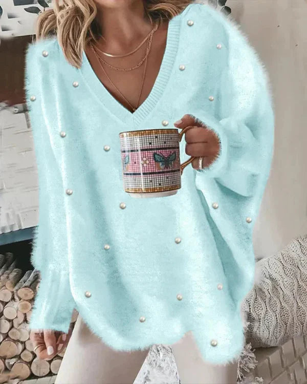 VALÉRIE – Zachte oversized trui met v-hals en pareldetails