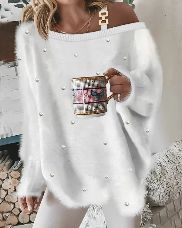 VALÉRIE – Zachte oversized trui met v-hals en pareldetails