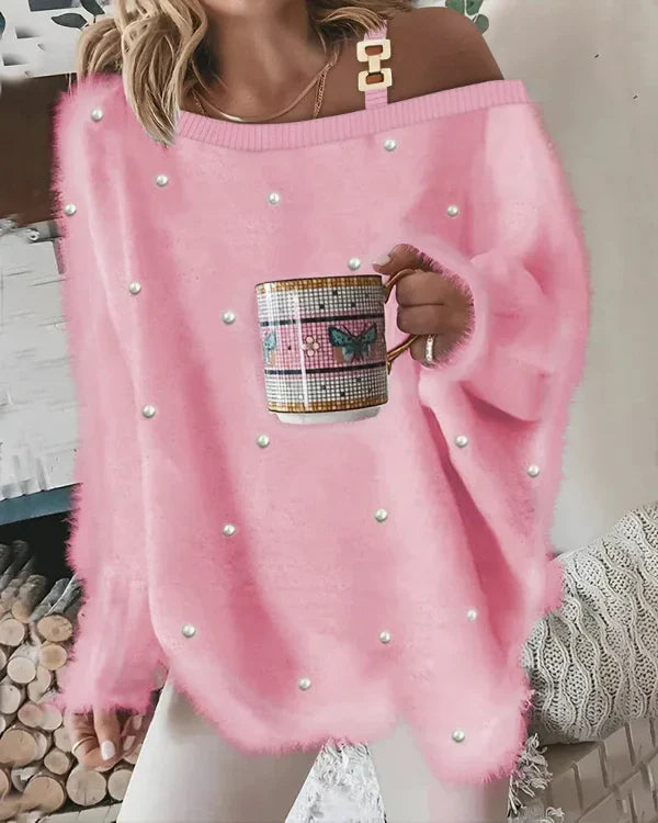 VALÉRIE – Zachte oversized trui met v-hals en pareldetails