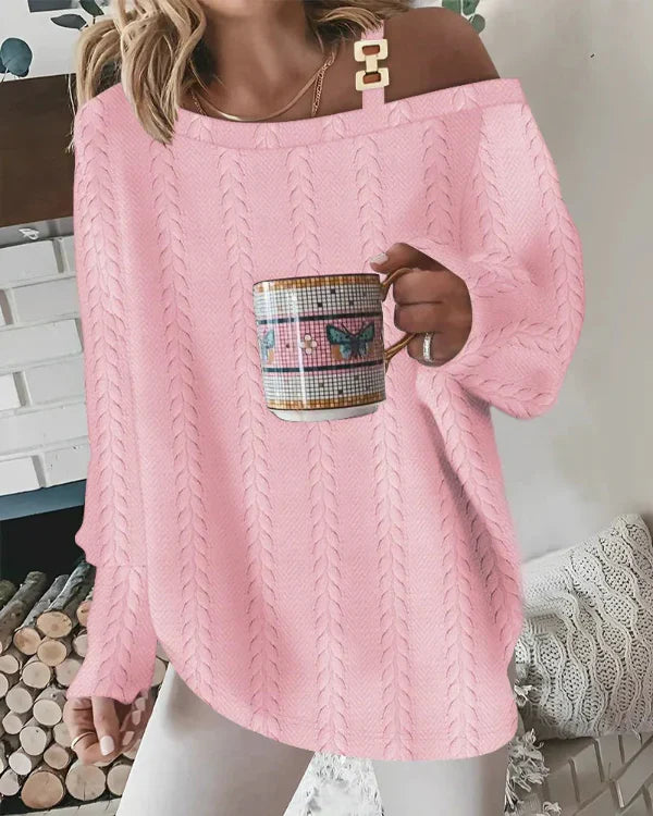 VALÉRIE – Zachte oversized trui met v-hals en pareldetails