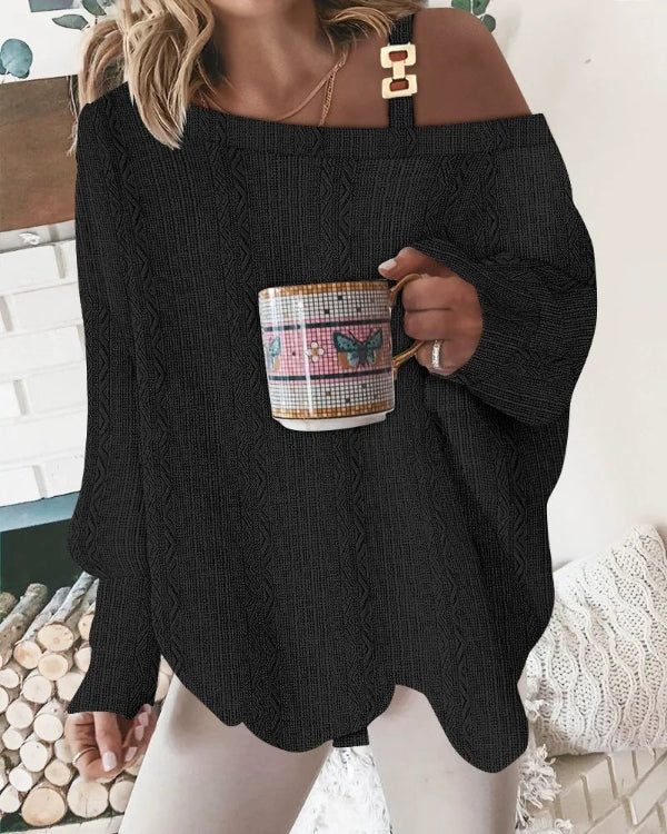 VALÉRIE – Zachte oversized trui met v-hals en pareldetails
