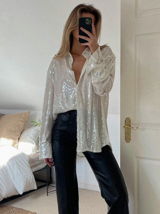 Sofie – Witte oversized blouse met zilveren glansdraad en ronde zoom