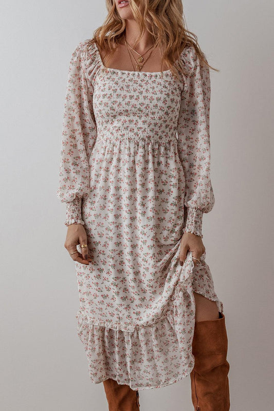 Liora – Casual-formele midi jurk met romantische ruches en flatterende pasvorm