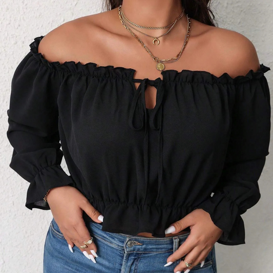 Raegan – flatterende off-shoulder dames top mer ruches