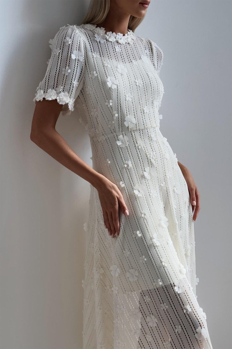 Kanten midi jurk met geborduurde details