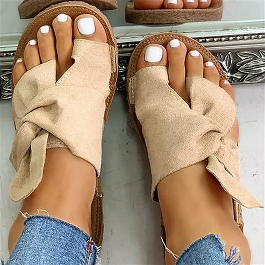 Romy –  slippers met gevlochten band en zacht voetbed
