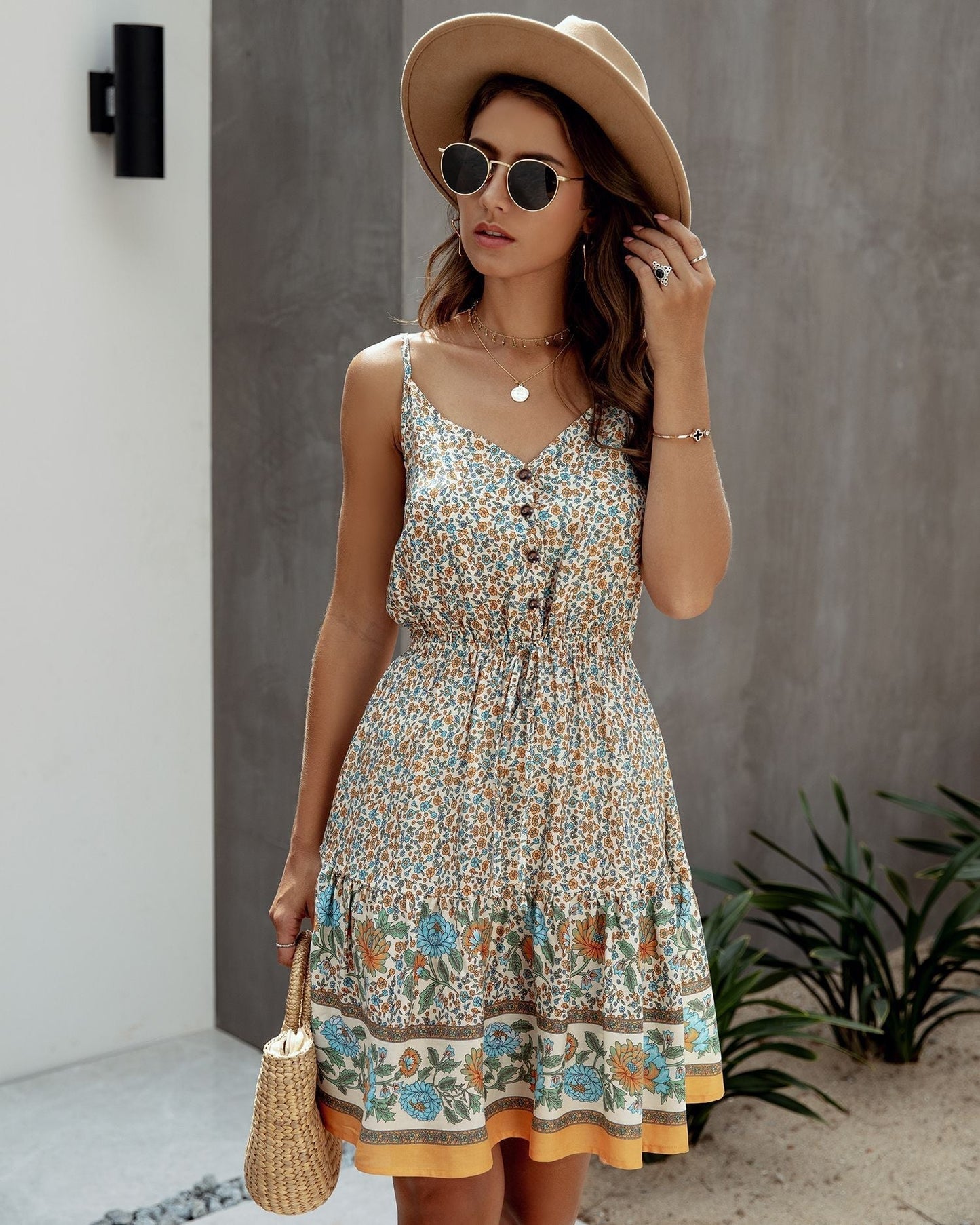Elise – Mouwloze midi Zomerjurk met zachte bloemenprint