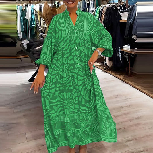 Lotte Bloom – Maxi jurk met kleurrijk bloemmotief en halflange mouwen